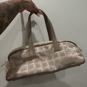 Chanel travel line tan hand bag